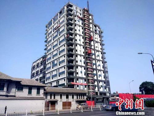 正在建设中的楼房。<a target='_blank'  data-cke-saved-href='http://www.chinanews.com/' href='http://www.chinanews.com/' >中新网</a>记者 李金磊 摄